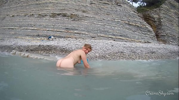 Nudist MILF Oxana Hot Shows Off Her Fat Ass At The Beach