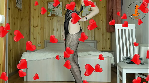 Redhead Foxy Shows Off In Fishnets With No Panties